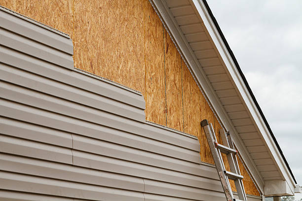 Professional Siding Repair technician working in Mineral Point, PA